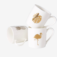 Laden Sie das Bild in den Galerie-Viewer, Moderne Espresso Tasse mit verschiedenen Motiven in weiß/gold
