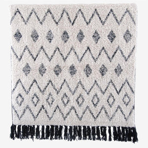 Teppich WAVES natur / schwarz mit Muster und Quasten 140x70