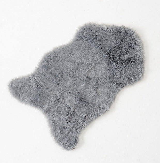 Dekofell SKOLDI 90x60 cm / Grau – Textilhaus Nückel